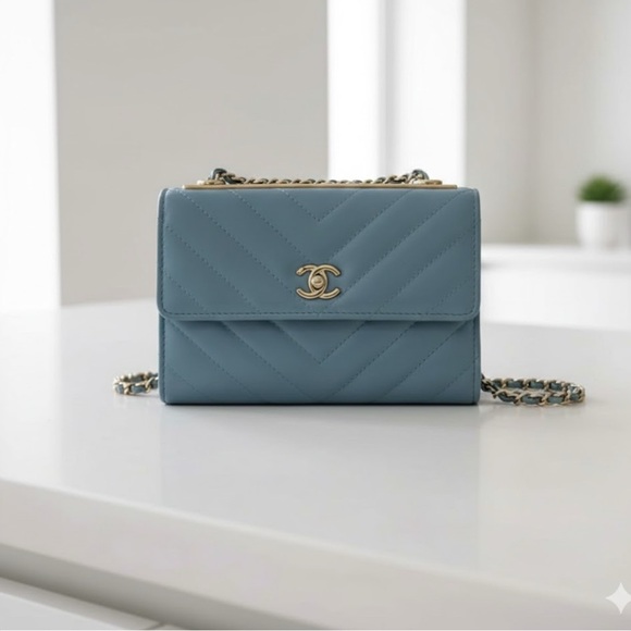 CHANEL Handbags - Chanel WOC Trendy Chevron CC blue crossbody bag with the box